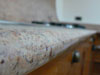Ripiano cucina in granito Sivakasi lucido con costa toroidale - Particolare della lavorazione